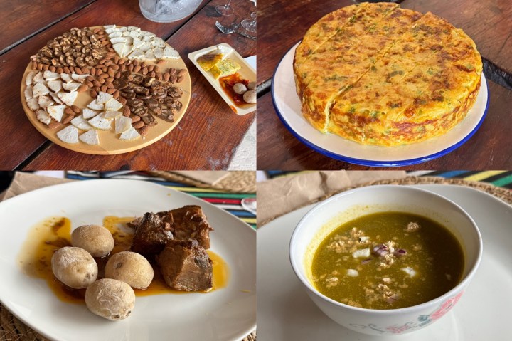 A wooden platter featuring various nuts, dried fruits, and cheese arranged artistically.